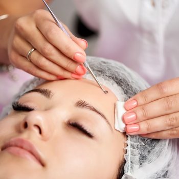 female-client-having-facial-treatment-with-the-hel-2022-05-13-01-03-52-utc